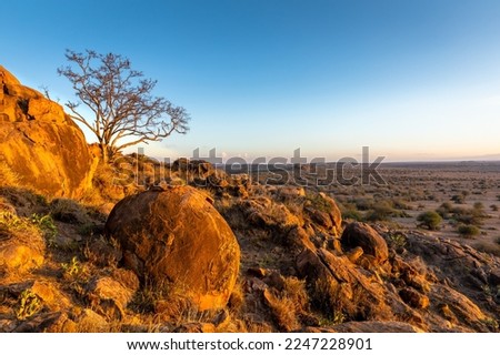 Foto Bild Landschaft mit Wüste und Klippen auf dem Land