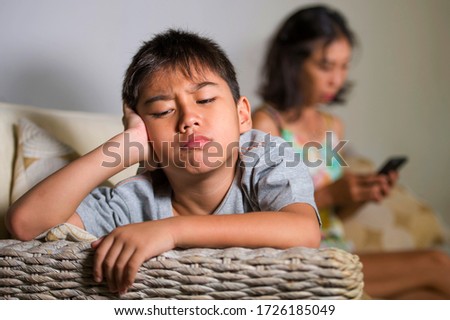 Similar – Image, Stock Photo Young asian boy stay alone and sadness