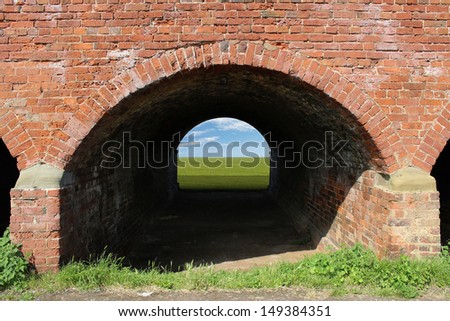 An Old Brick Arch with Blue Sky