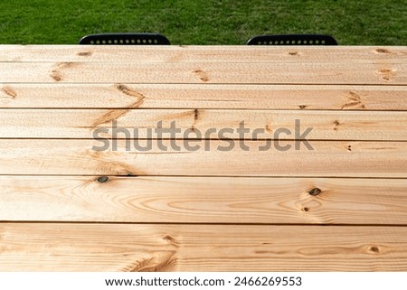 Similar – Image, Stock Photo Wet garden table made of rustic wood covered with light frost