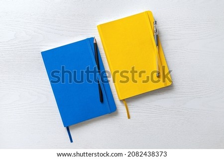 Similar – Image, Stock Photo closed notebook and wooden blue pencil
