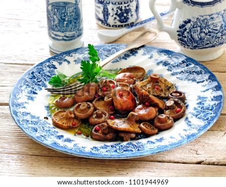 Similar – Image, Stock Photo Saffron milk cup mushroom (lactarious deliciosus) in a basket