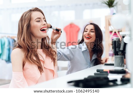 Similar – Image, Stock Photo Mirror image of two female legs and a hand with red nail polish in the mirror