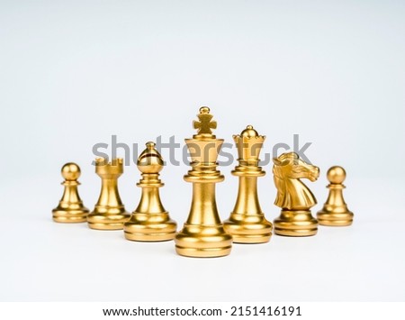 Set of luxury golden chess pieces isolated on white background. The photo of gold chess, king, rook, bishop, queen, knight, and pawn. 商業照片 © 