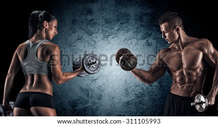 Man and woman isolated on a dark background