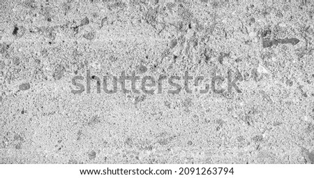 Old concrete construction. Concrete is a composite material consisting of fine and coarse aggregates bonded together with liquid cement (cement paste), which hardens (hardens) over time Photo stock © 