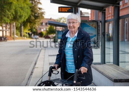 Similar – Image, Stock Photo Senior citizen with rollator