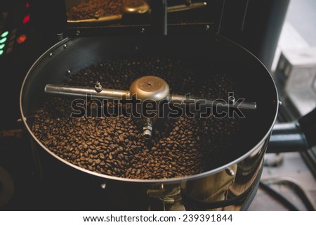 freshly roasted coffee beans n a coffee roaster