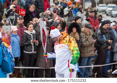 January 11, 2014, Saratov, Russia. Olympic Torch Relay Sochi 2014. Member of the relay waits for his turn