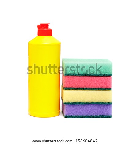 sponge for washing dishes and a bottle of liquid