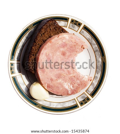Sausage with rye bread and garlic on a plate, ho-rs d\'oeuvres
