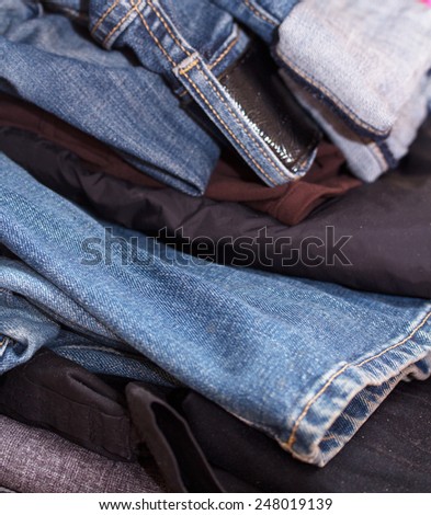 pile of old clothing items