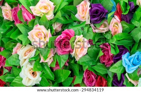 beautiful artificial roses flowers for background.
