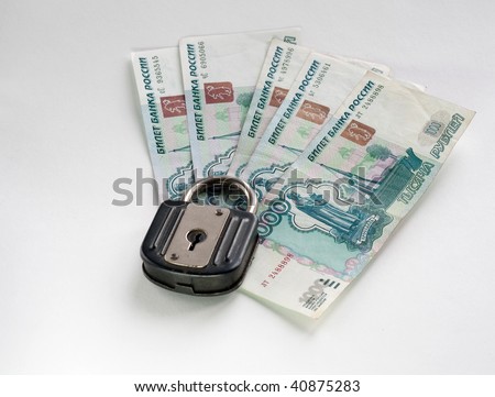 locked money of rubles on light background