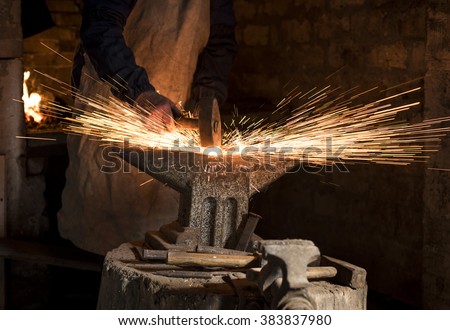 Similar – Image, Stock Photo Blacksmith hands forging molten metal on anvil