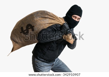 Thief robbed bank and is carrying full bag of money. Isolated on white background. Foto stock © 