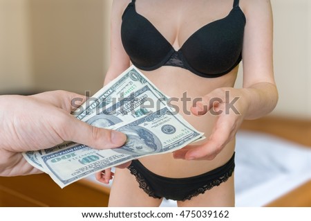stock-photo-prostitution-concept-young-sexy-hooker-is-taking-money-for-her-work-475039162.jpg
