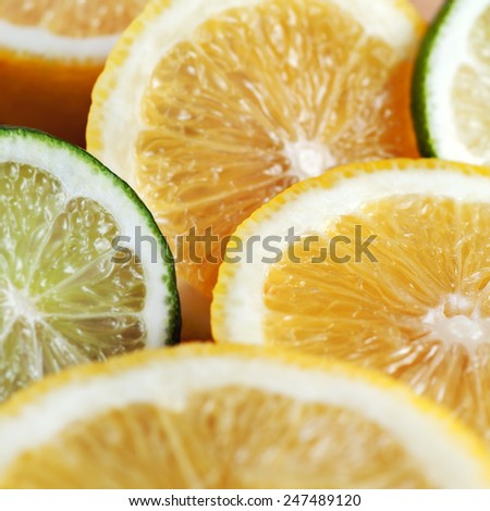 Sliced citrus fruits background lemon, lime Close-up with shallow depth of field