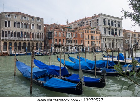 VENICE, ITALY - MAY 11: Gondola\'s in the Grand Canal of Venice on May 11, 2012. The Grand Canal flows in an S-shape through the central districts of the city and is the city\'s main traffic corridor.