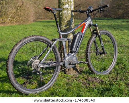ALMERE, NETHERLANDS - FEB. 3, 2014: Photo of a state of the art Cube electric powered mountainbike which uses a Bosch motor and provides a smooth and easy ride on rough terrain