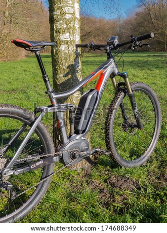 ALMERE, NETHERLANDS - FEB. 3, 2014: Photo of a state of the art Cube electric powered mountainbike which uses a Bosch motor and provides a smooth and easy ride on rough terrain