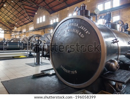 LEMMER, NETHERLANDS - 2 MARCH 2014: Inside the machine room of historic Wouda steam pumping station from 1920, the largest ever built still in operation. It pumps away excess water in Friesland.