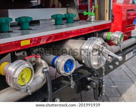 ALMERE, NETHERLANDS - 12 APRIL 2014: Valves of a modern Dutch fire engine on display during the first National Security Day held in the city of Almere