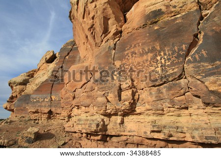 Two panels of petroglyphs carved into cliff walls by prehistoric Native American(s) at Canaan Gap, Arizona Strip, USA.