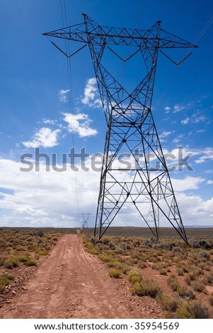View of large electricity cable tower in northern Arizona desert.