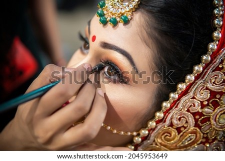 Similar – Image, Stock Photo Crop woman doing makeup in studio