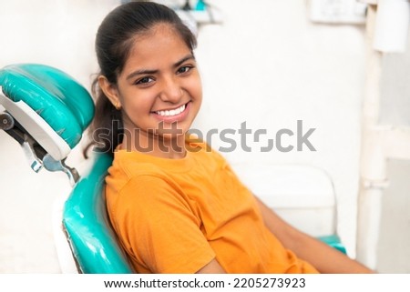 Image, Stock Photo Positive female patient sitting on bed in hospital