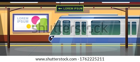 Metro station or railway terminal concept. Subway station interior design with no people. Sign wit directions and big advertisement banner on the wall. Train arriving on empty platform.