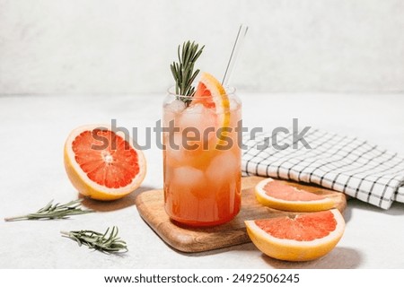 Similar – Foto Bild Grapefruit-Kaltgetränk und Grapefruitscheiben im Sonnenlicht