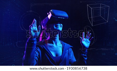 Future digital technology metaverse game and entertainment, Teenager having fun play VR virtual reality goggle, sport game 3D cyber space futuristic neon colorful background, 