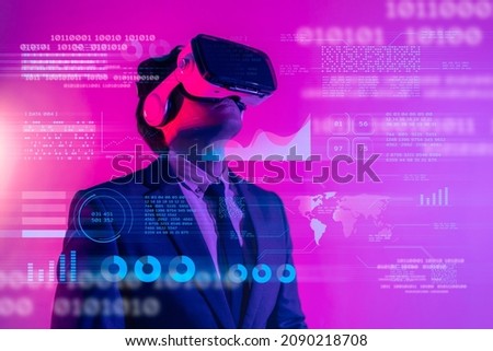 Future game gamefi and entertainment digital technology. Teenager having fun play VR virtual reality glasses sport game metaverse NFT game 3D cyber space futuristic neon colorful background.