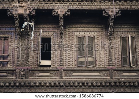 old great architectured building having open window and 4 windows in line with traditional old designs, placed in Ahmedabad Gujarat  ストックフォト © 