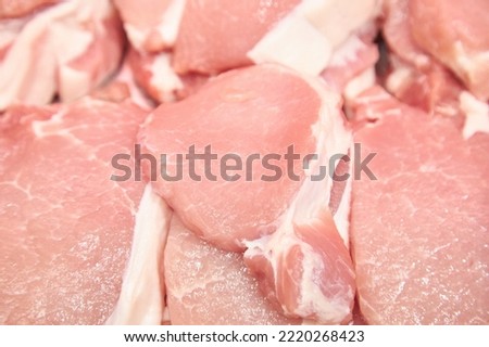 Raw marbled pork meat on display in the store Stockfoto © 