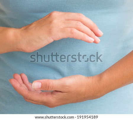 Woman's hands in classical Tai Chi pose