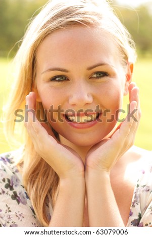 Closeup portrait of cheerful lady with bright smile