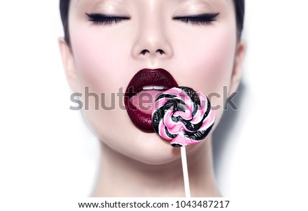 Sexy Girl Eating Lollipop Beauty Glamour Model Woman Licking Sweet Colorful Lollipop Candy Close Sexy Girl Eating Lollipop Beauty Glamour Model Woman Licking Sweet Colorful Lollipop Candy Close