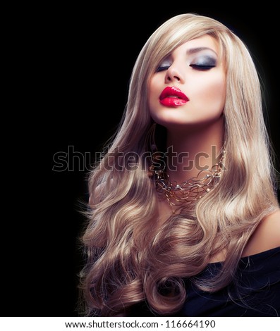 Beautiful Sexy Blond Girl. Blonde isolated on a Black Background