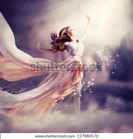 Fashion Art Beauty Portrait. Beautiful Girl, Model Woman wearing Long Chiffon dress. Magic. Miracle. Fantasy Scene
