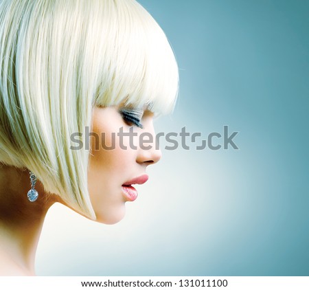 Haircut. Hairstyle. Hairdressing. Fringe. Beautiful Model with Short Blond hair. Bob. Fashion Blonde Girl