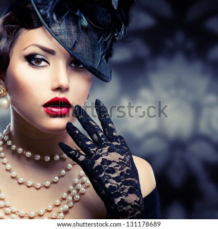 Retro Woman Portrait. Vintage Style Girl Wearing Old fashioned Hat and Gloves, retro Hairstyle and Make-up