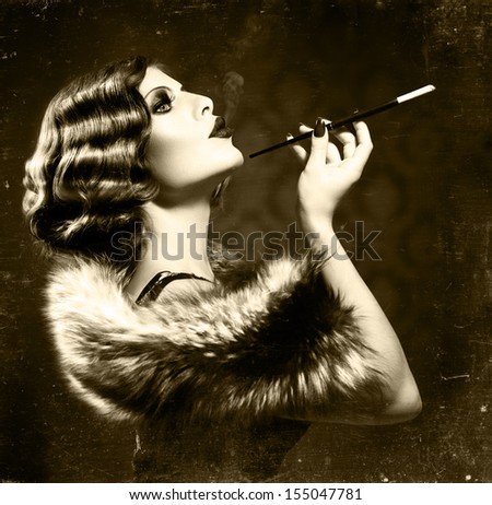 Retro Woman Portrait. Beautiful Woman with Mouthpiece. Cigarette. Smoking Lady. Vintage Styled Black and White Photo. Old Fashioned Makeup and Finger Wave Hairstyle. 20\'s or 30\'s style. Sepia toned