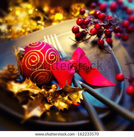 Christmas And New Year Holiday Table Setting. Celebration. Place setting for Christmas Dinner. Holiday Decorations. Decor.