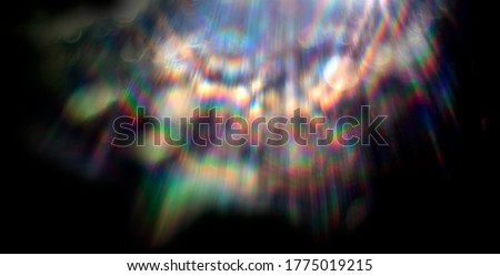 Lens flare effect on black background. Abstract Sun burst, sunflare for screen mode using. Sunflares nature abstract rainbow colourful backdrop, blinking sun burst, lens flare optical rays.