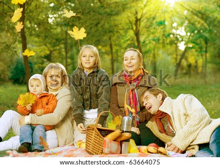 Happy Big Family in Autumn Park.Picnic.Copy-space