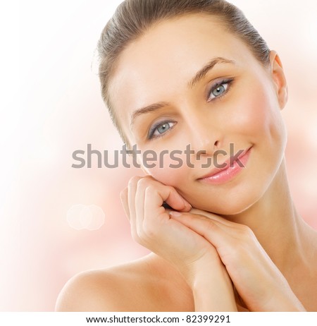 Beautiful Healthy Woman touching her skin. Middle Aged