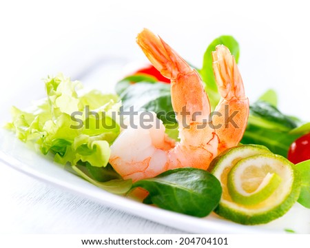Prawn salad. Healthy Shrimp Salad with mixed greens and tomatoes. Diet. Weight Loss Food. Shrimps